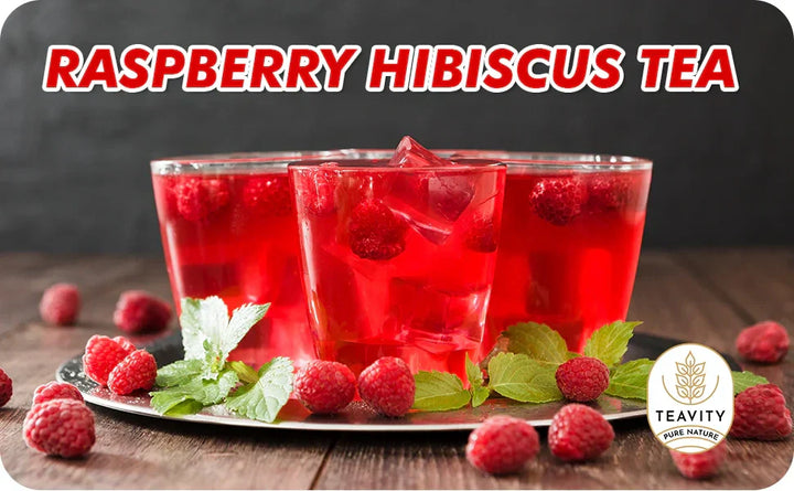 Raspberry hibiscus iced tea with fresh berries and mint herbal drink